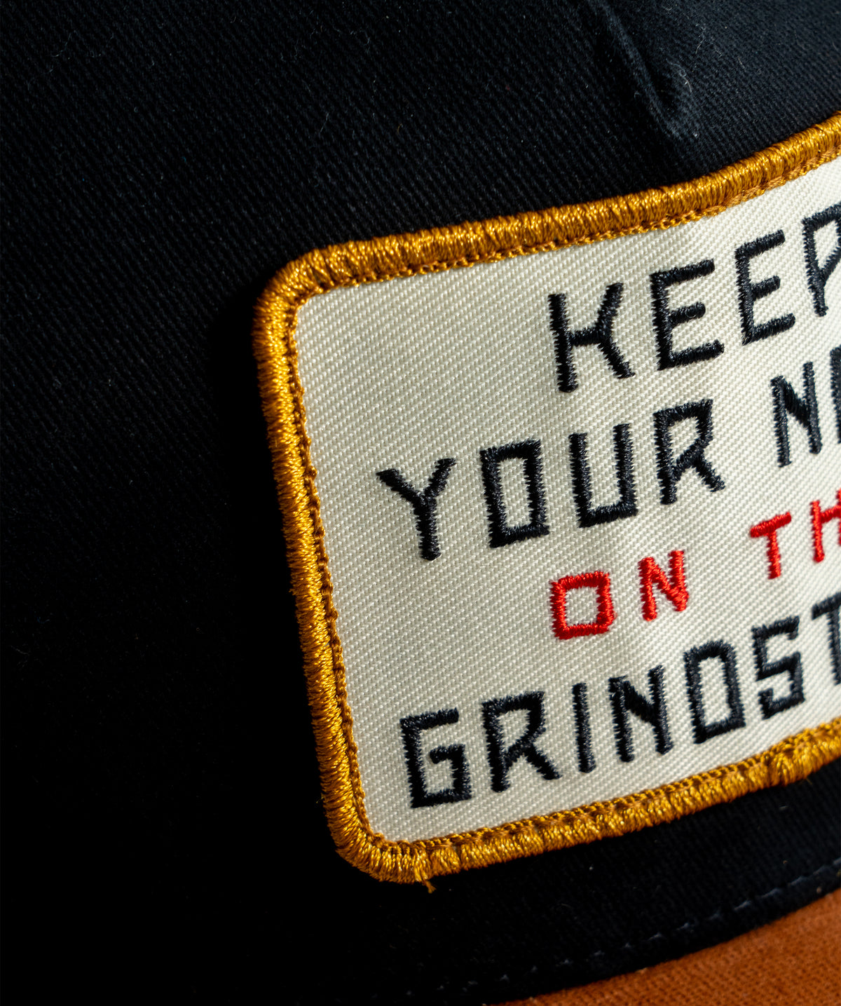 Keep Your Nose On The Grindstone Trucker Hat • Tyler Childers x Oxford Pennant