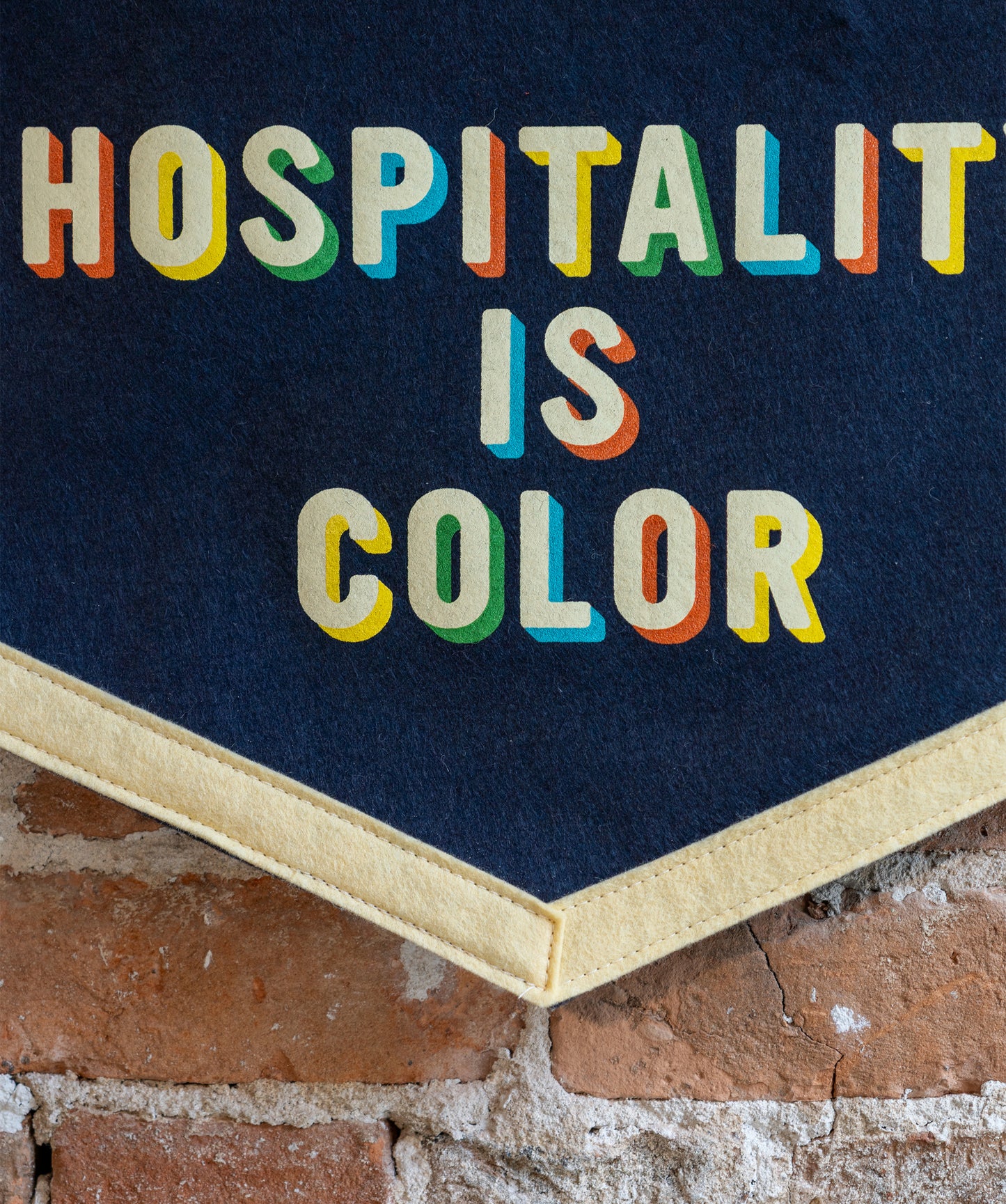 Service Is Black & White Hospitality Is Color Camp Flag • Unreasonable Hospitality x Oxford Pennant