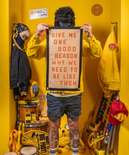 Give Me One Good Reason Why We Need To Be Like Them Camp Flag • Blink-182 x Oxford Pennant