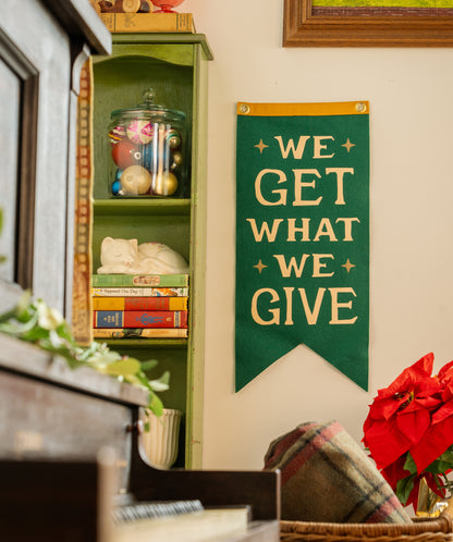 We Get What We Give Scout Flag