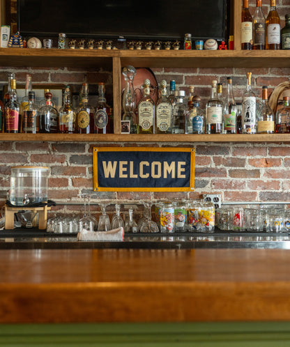 Welcome Championship Banner • Unreasonable Hospitality x Oxford Pennant