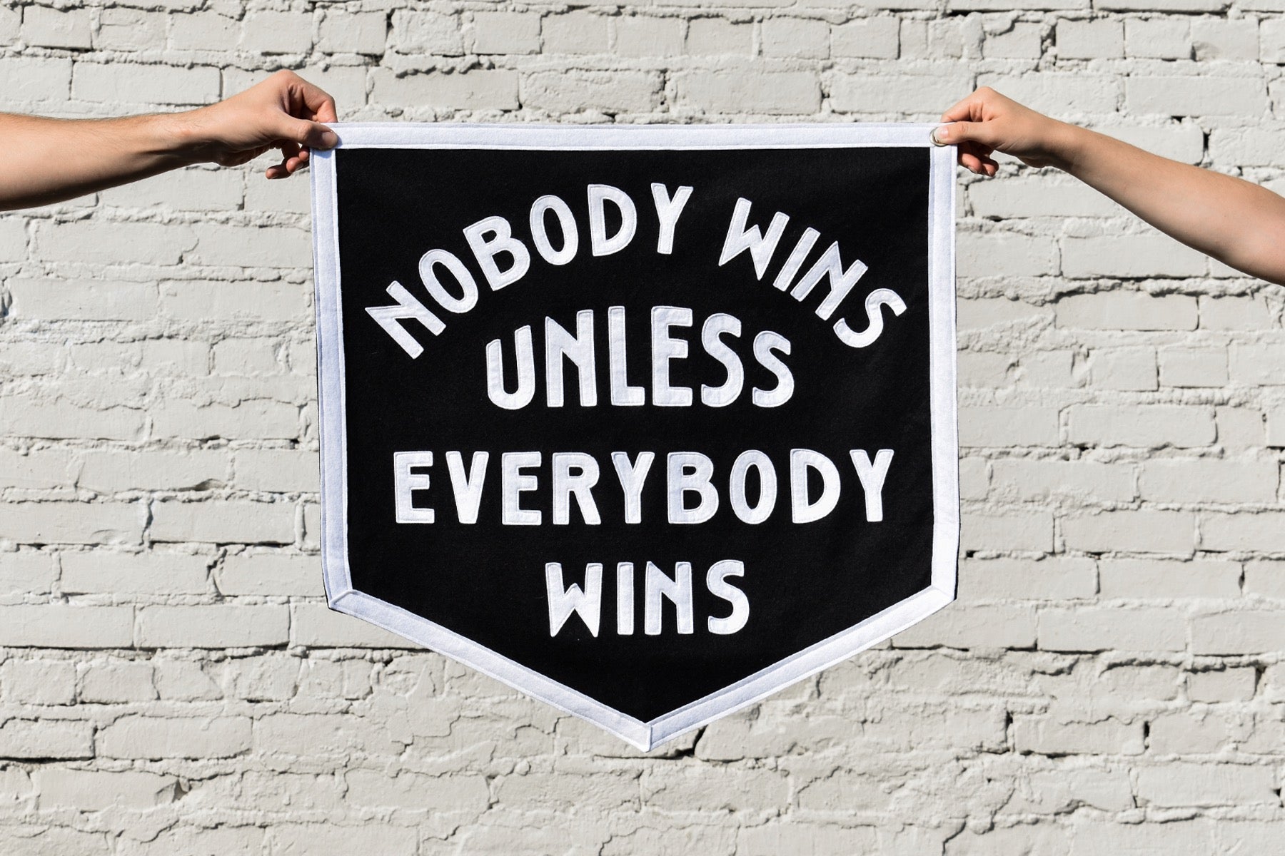 Nobody Wins Unless Everybody Wins Championship Banner